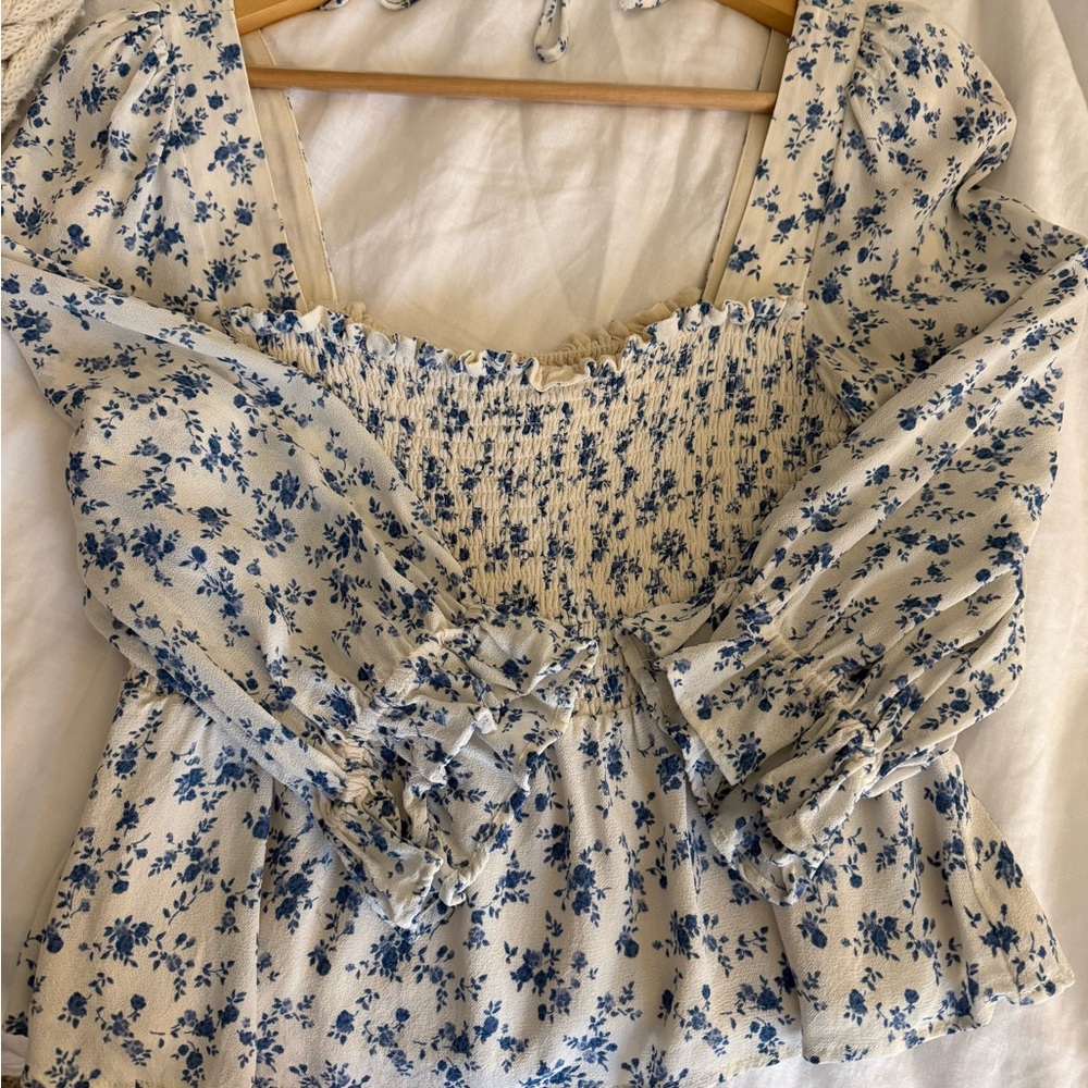 Reformation blue toile chiffon blouse with smocked bodice and billowy sleeves